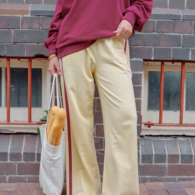 Gigi Wide Leg Terry Track - Washed Butter With Burgundy Side Stripe